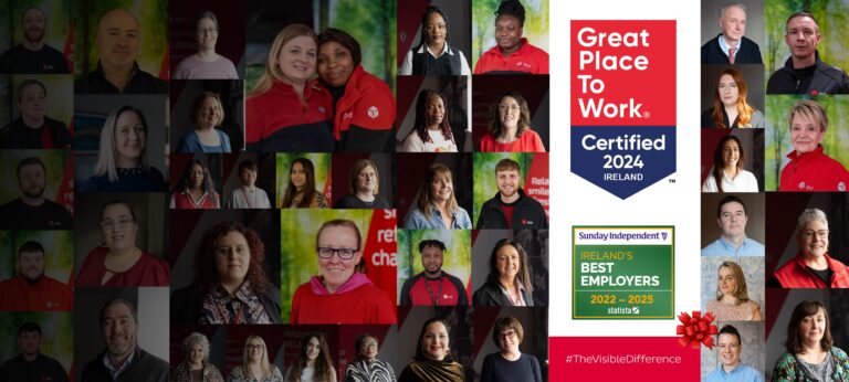 Employees of DPD Ireland together, smiling in the workplace